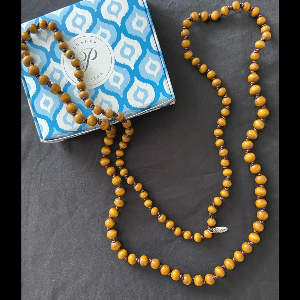 Wood beads 64” can be twisted in a knot.